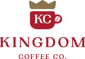 Coffee mug with letters, crown, and coffee bean.